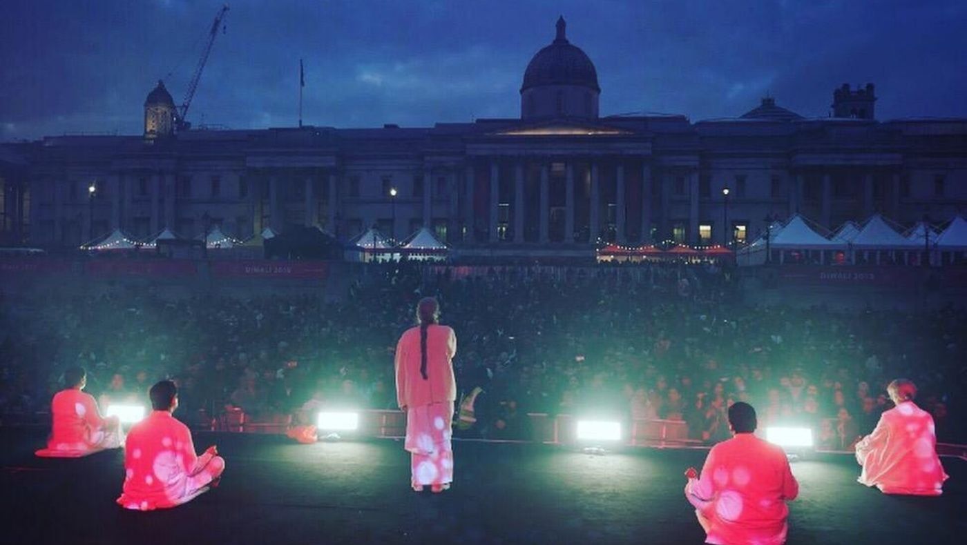 Sister Jayanti leads the crowd into a moment of reflection at Diwali on Trafalgar Square, 2019.